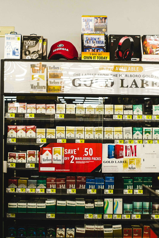 a display of cigarettes and cigarettes in a store